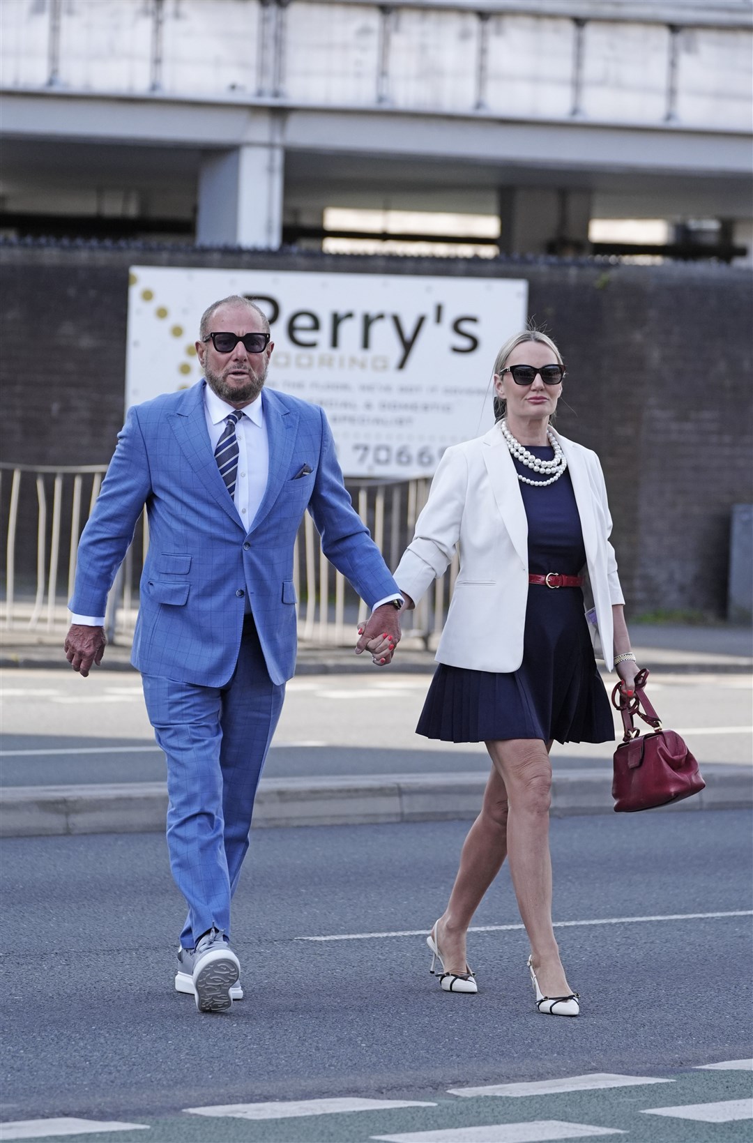 Derek Hatton, who was deputy leader of Liverpool council in the 1980s, arrives with his wife Sonjia Hatton at Preston Crown Court, Lancashire, where he is charged along with eleven other people as part of an investigation into the awarding of contracts by Liverpool City Council. Picture date: Friday April 25, 2025.