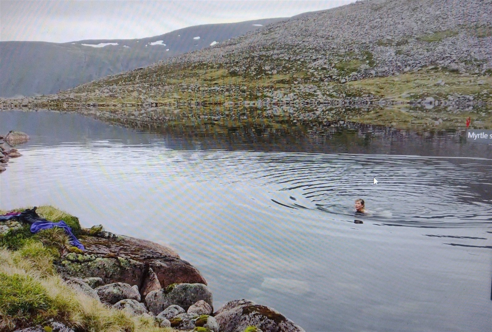 The author cools the hidden fires in an icy tarn during her research