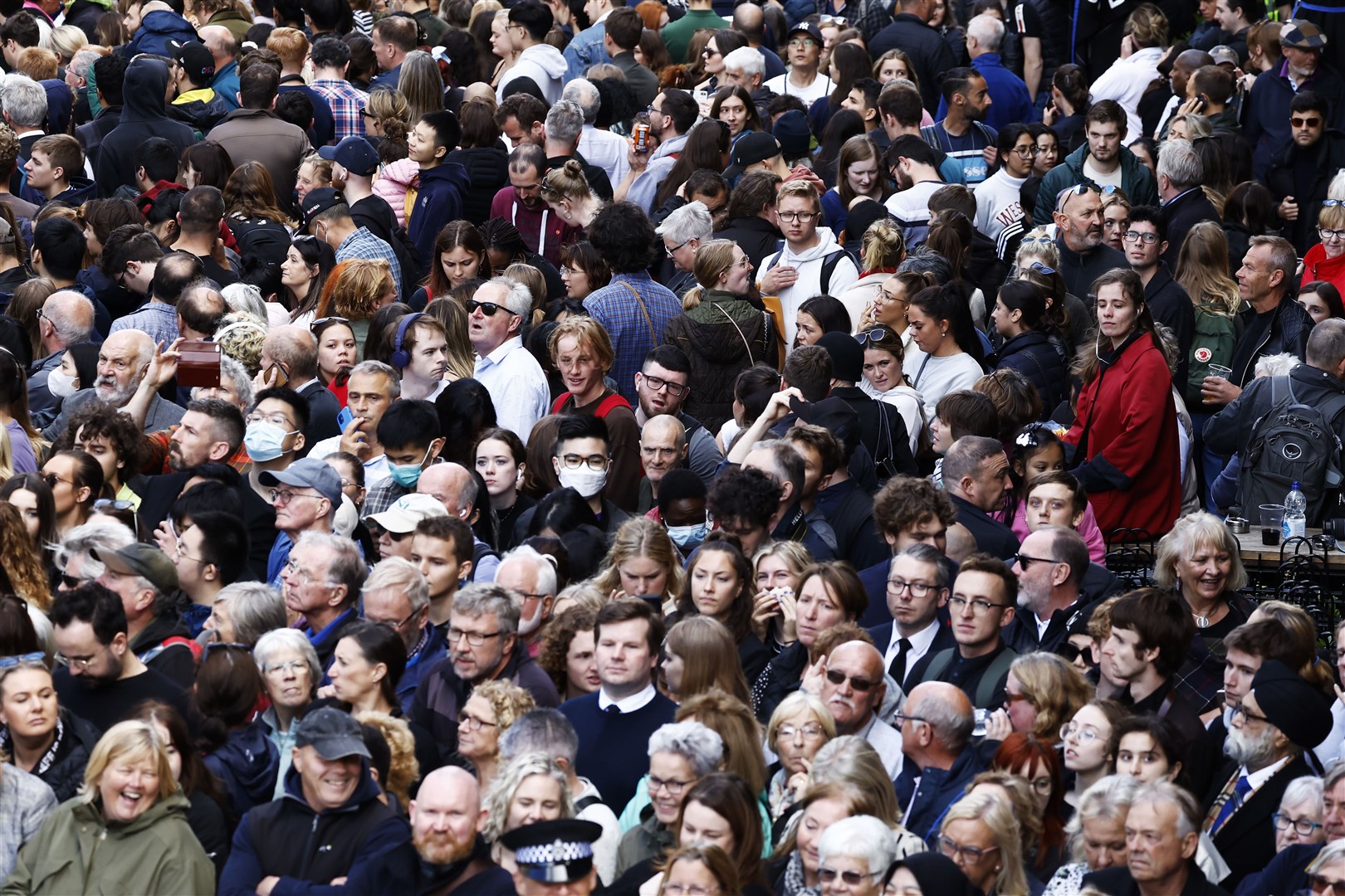 Thousands gathered along the Royal Mile to watch the procession (Jeff J Mitchell/PA)