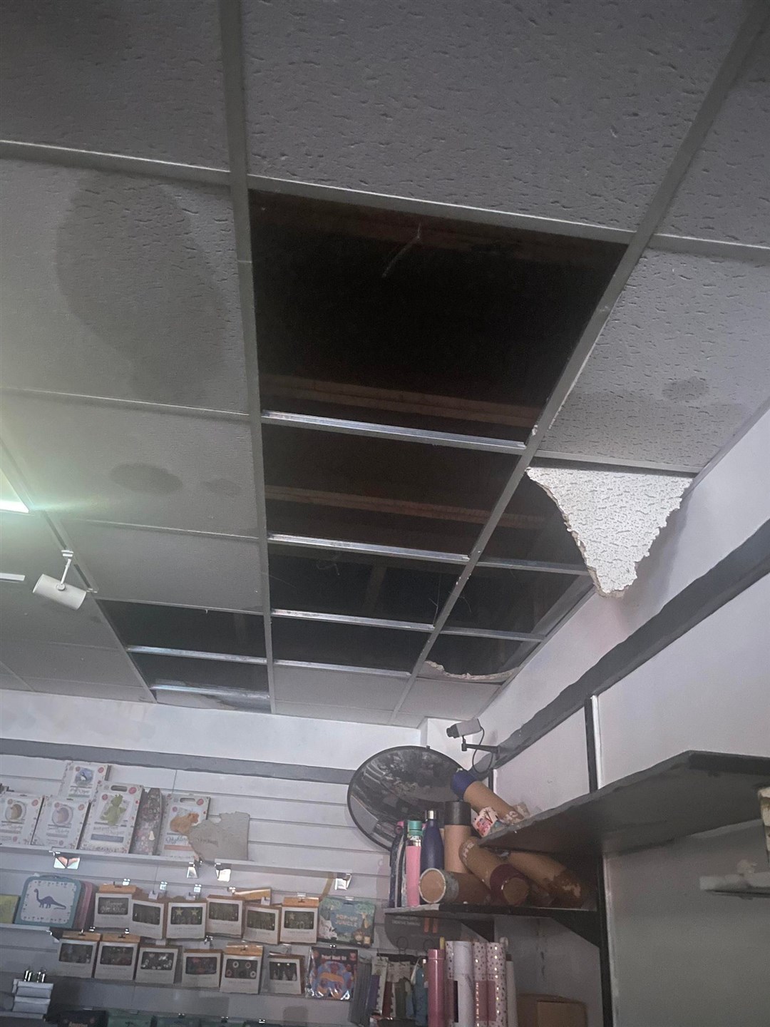 Devastation: the smashed ceiling at Aviemore Gift Company.