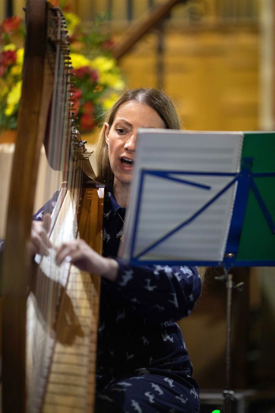 Eilidh Davies play the Clàrsach and sings at The Royal National Mòd, 2021 annual church service.