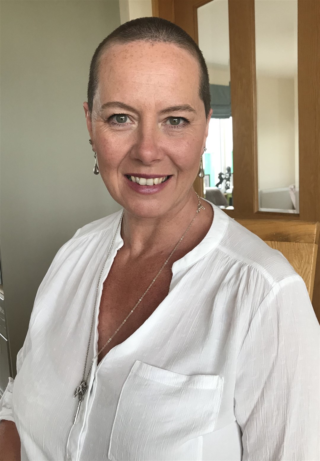 AFTER: Lisa's new hairstyle, courtesy of 16-year-old son Xander