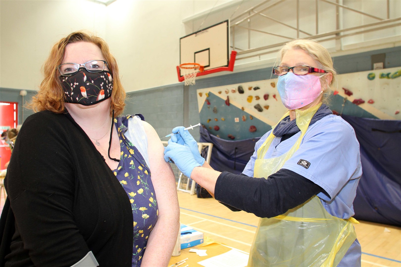 Melanie Dick gets her Covid-19 vaccination from practioner Hannah Smith in Grantown last week.
