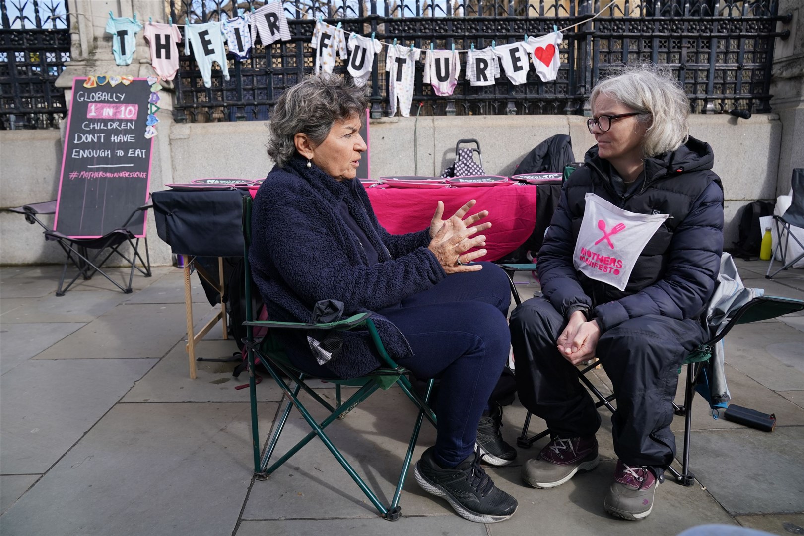 Christiana Figueres with hunger striking mother Emma Hopkins (Jonathan Brady/PA)