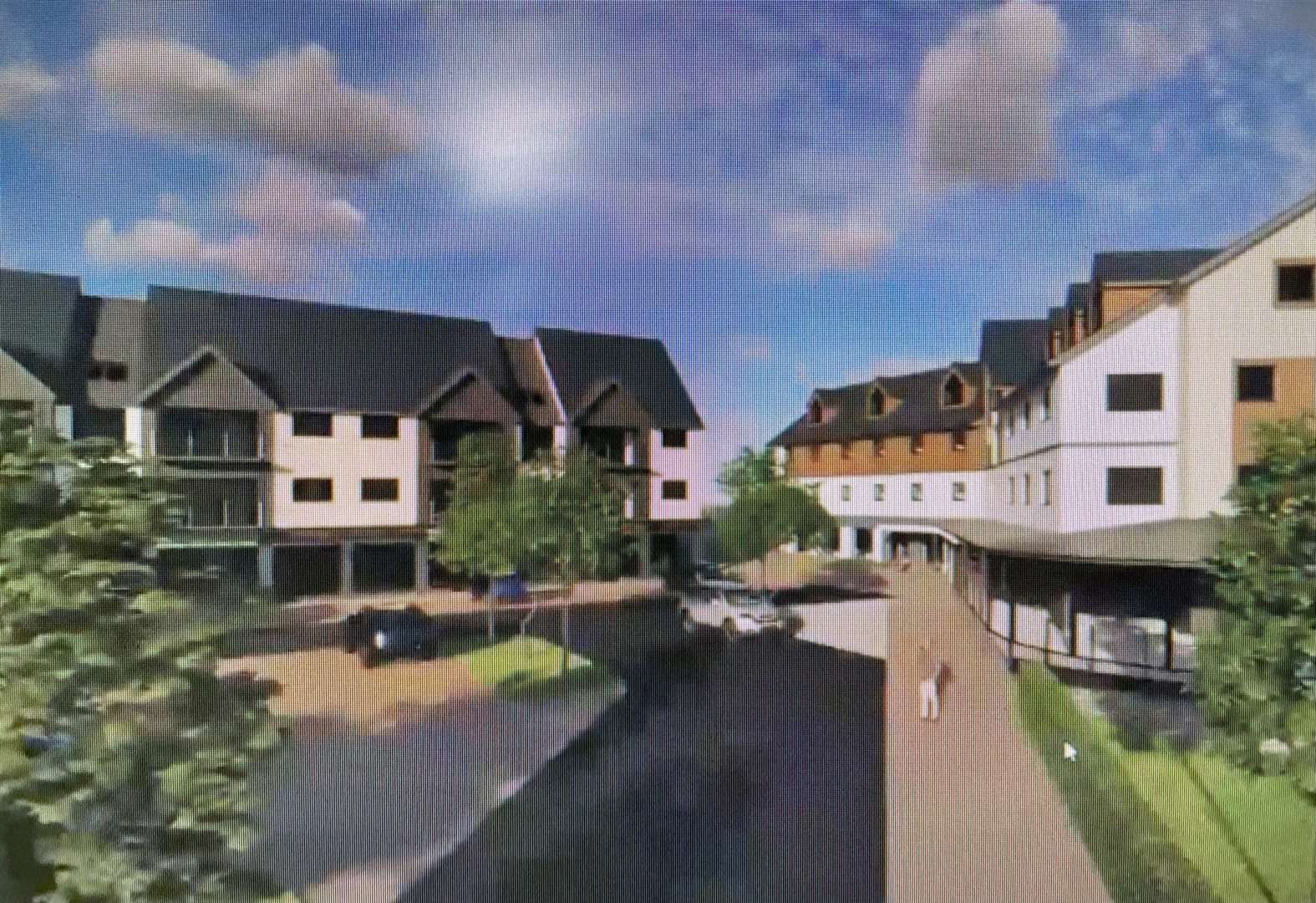 The proposed hotel (right) and the shops with holiday accommodation (left).