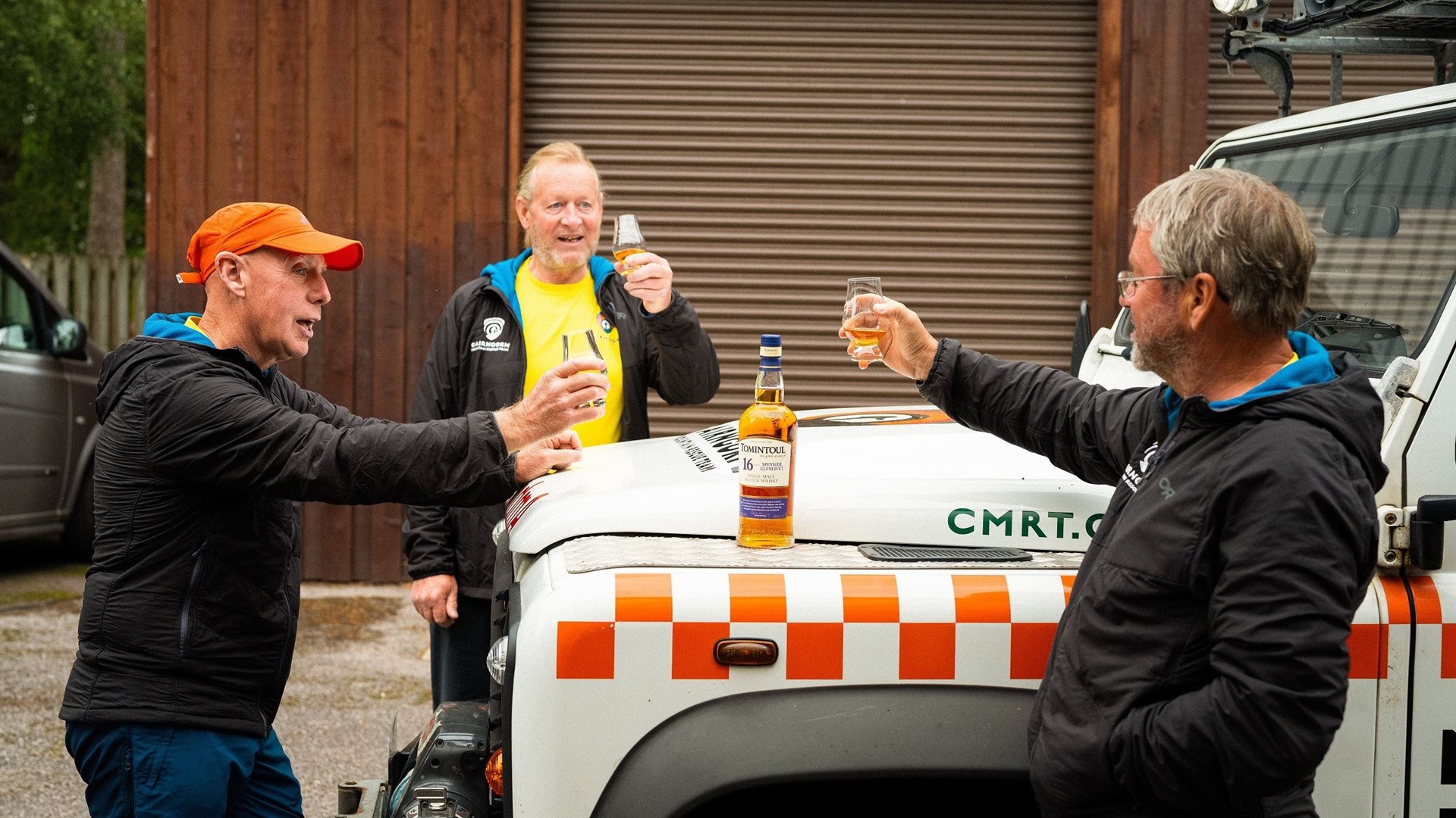 THAT'S THE SPIRIT: A hearty toast at the base this week to the craitur. From left, Willie Ross, Donnie Williamson and Willie Anderson.
