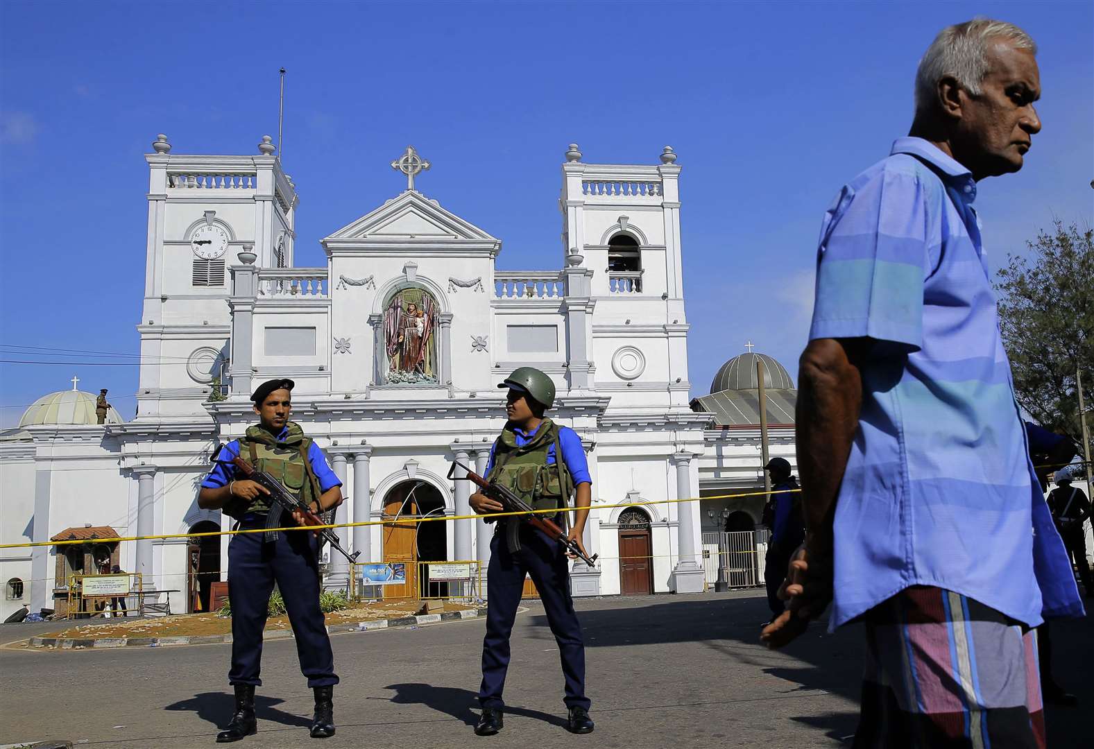 Sri Lankan Navy soldiers stand guard in front of the St. Anthony's Shrine a day after the series of blasts, in Colombo, Sri Lanka, Monday, April 22, 2019. Easter Sunday bombings of churches, luxury hotels and other sites (AP Photo/Eranga Jayawardena)