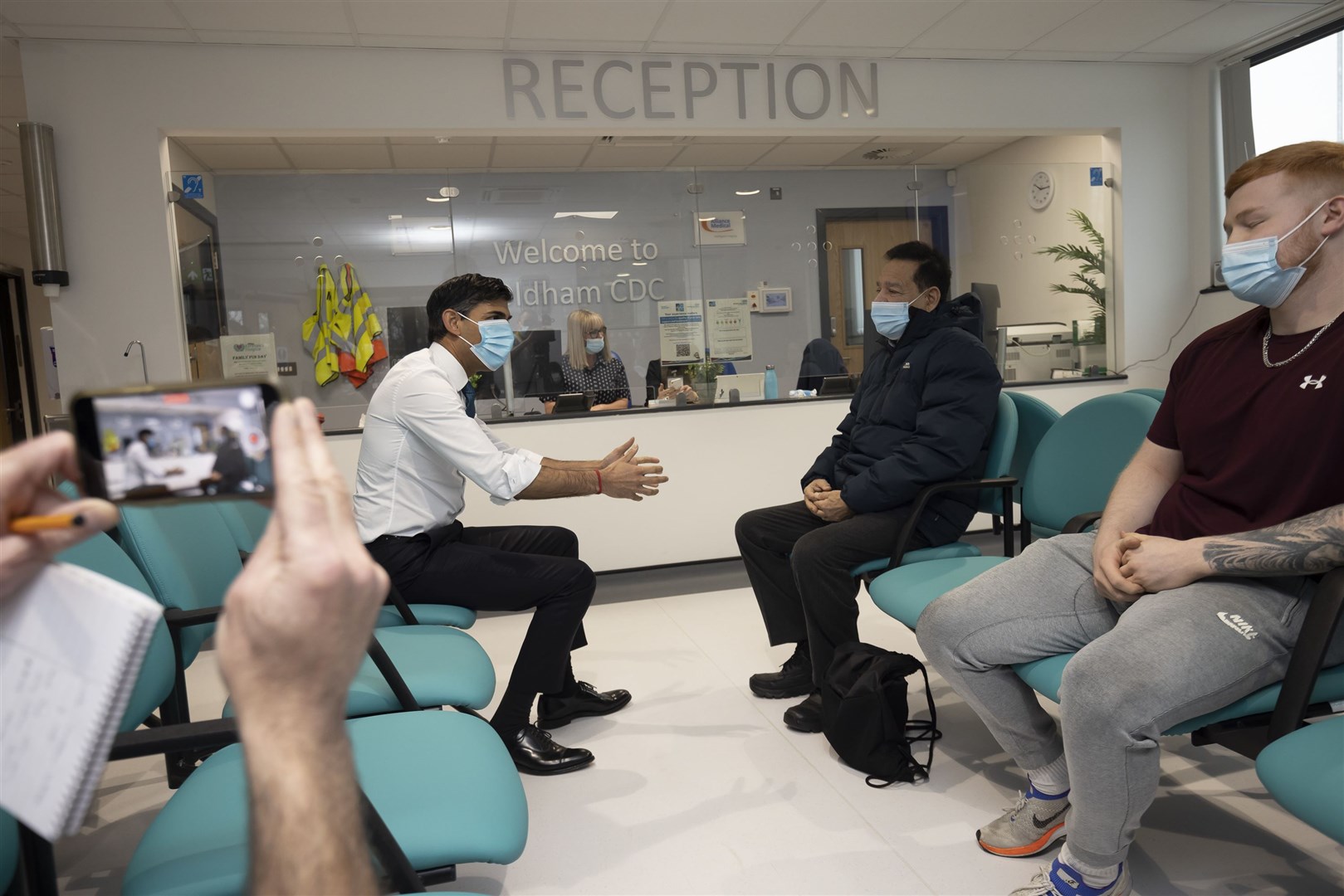 Prime Minister Rishi Sunak talks with a patient, Riaz Ahmad, during a visit to Oldham Community Diagnostic Centre in Greater Manchester (James Glossop/The Times/PA)