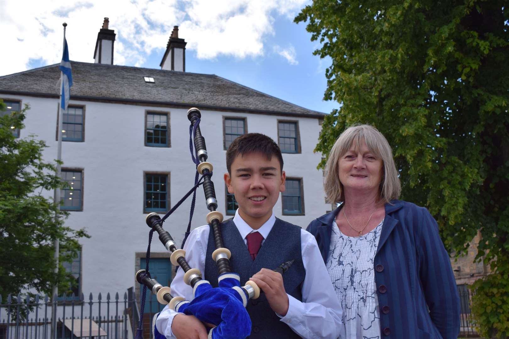 Chair of Friends of Highland Music Moira Leslie with grant recipient Kyle Cameron