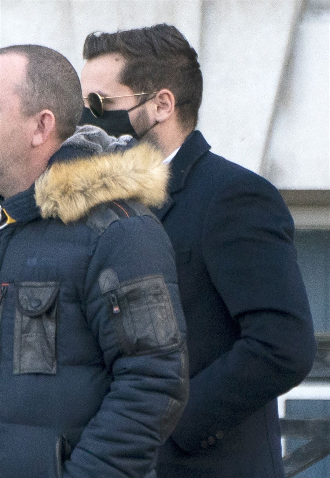 Metropolitan Police officer Rupert Edwards (glasses) leaves Inner London Crown Court, where he is charged with two counts of rape (Kirsty O’Connor/PA)