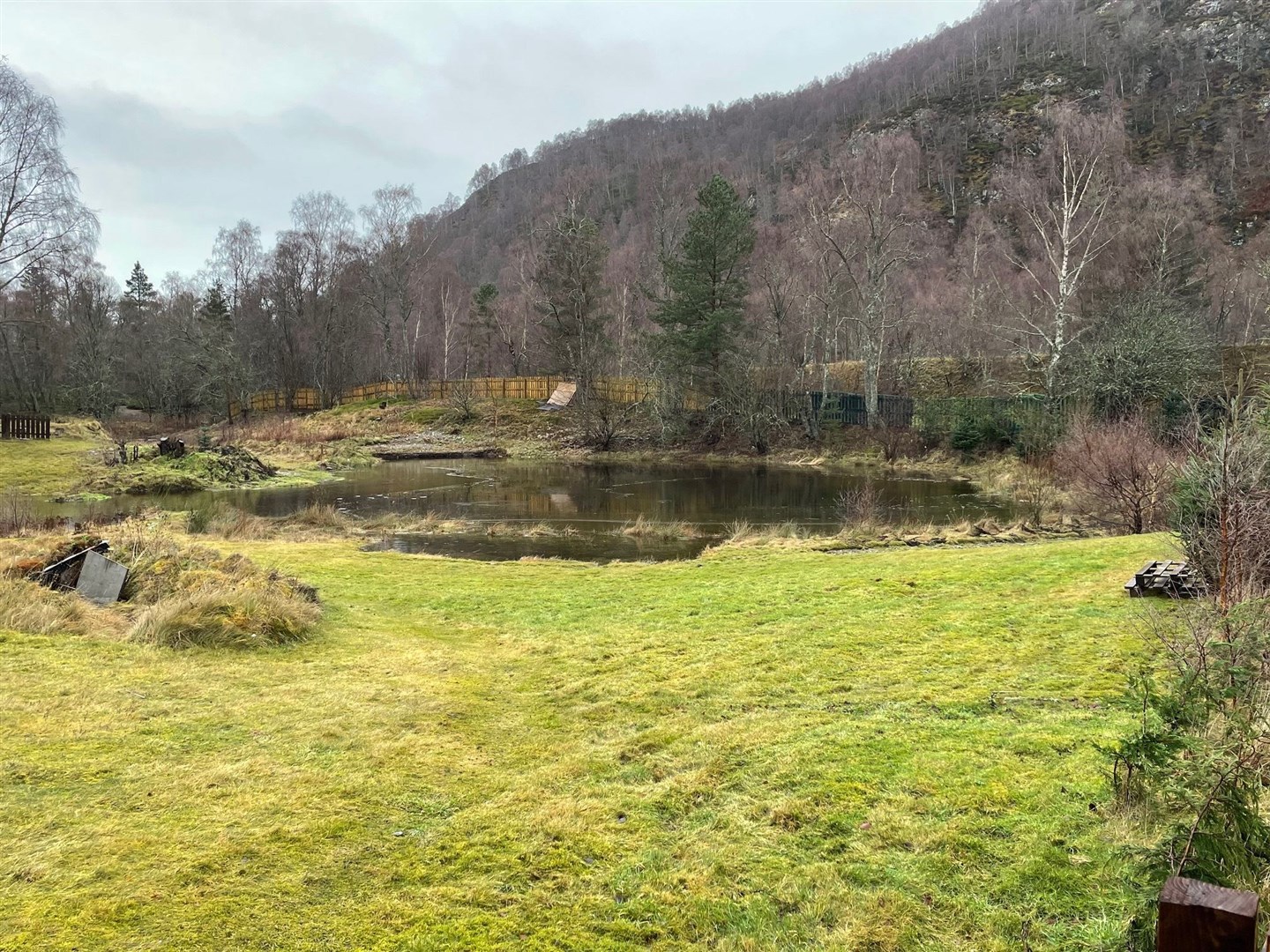 The lochan which is stocked with fish by a local photography and wildlife watching business and is visited by ospreys.