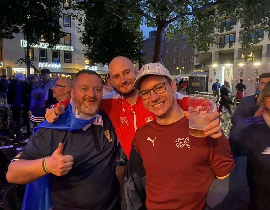 Kenny Morrison (left) mingled with the Swiss supporters last night in Cologne.