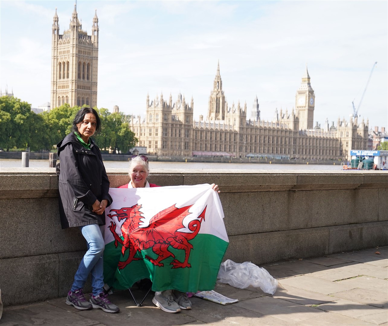 Vanessa Nathakumaran, and Anne (last name not given) are the first two people to arrive on Lambeth Bridge (Stefan Rousseau/PA)