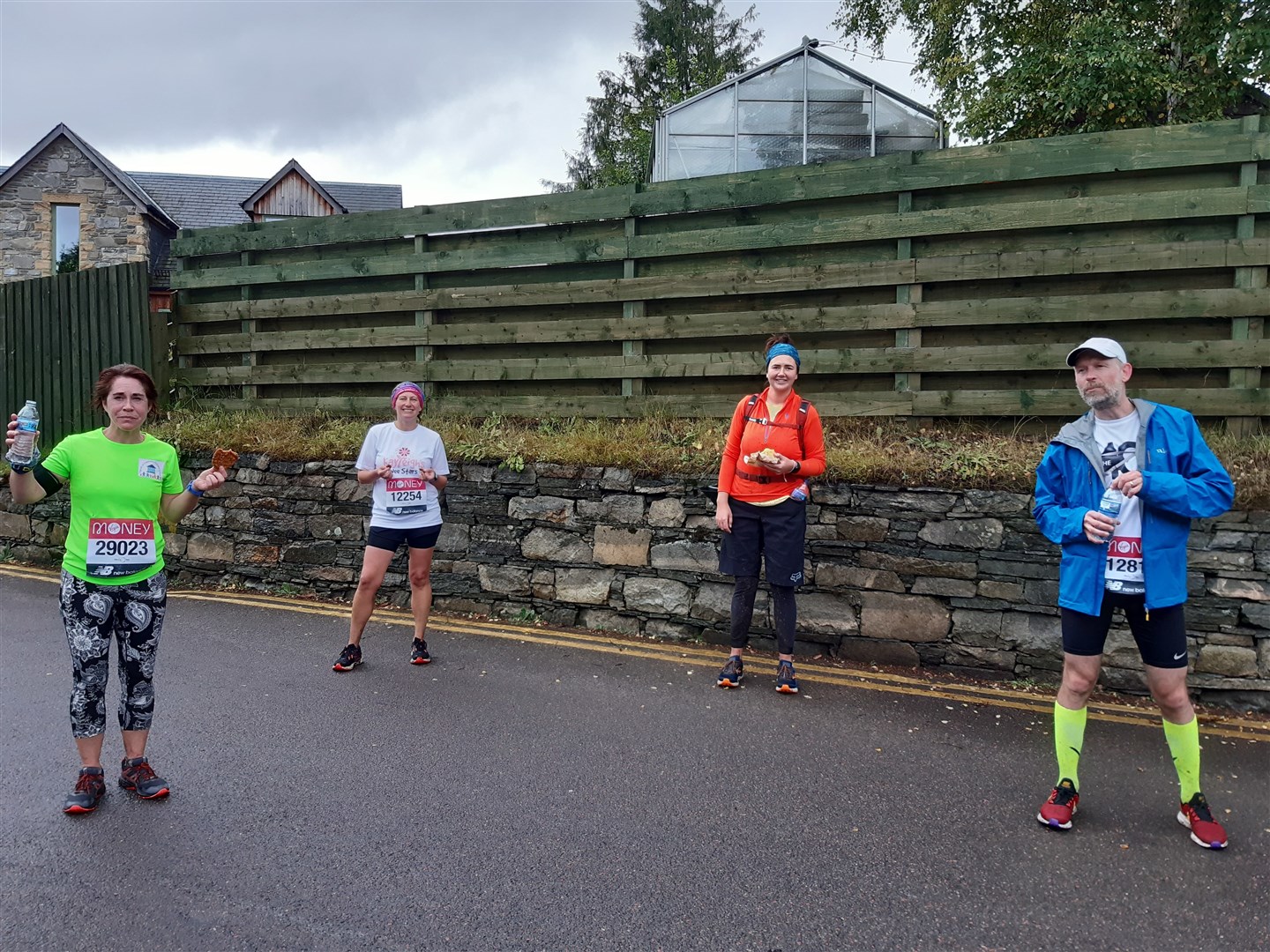 AT THE FINISH LINE: Vicki Cowan, Cara Brooks, Natalia Wieckowska and Tim Artus ran the Virtual London Marathon from the Coire Cas car park at Cairngorm Mountain to Grantown.