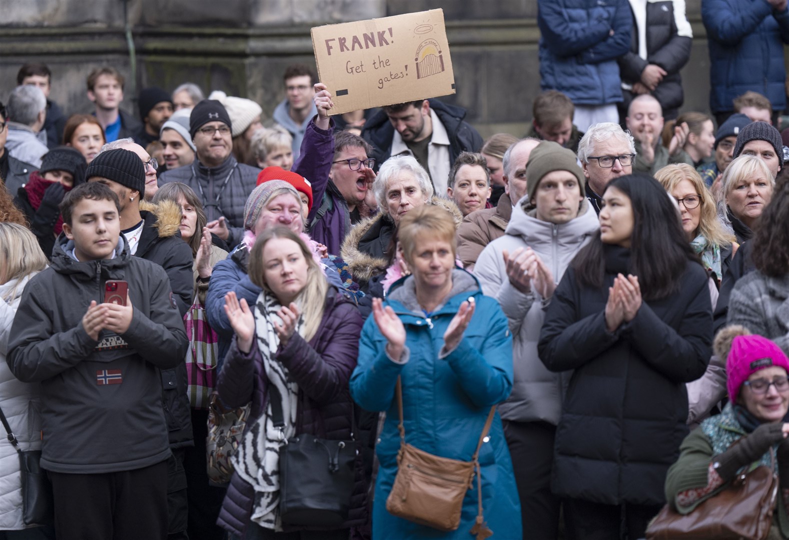 Fans clapped as the hearse travelled by (Jane Barlow/PA)