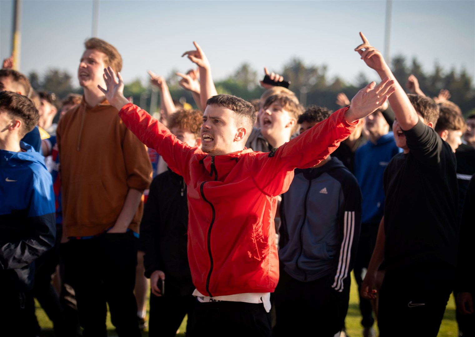 Fans protested on the pitch at full time. Picture: Callum Mackay