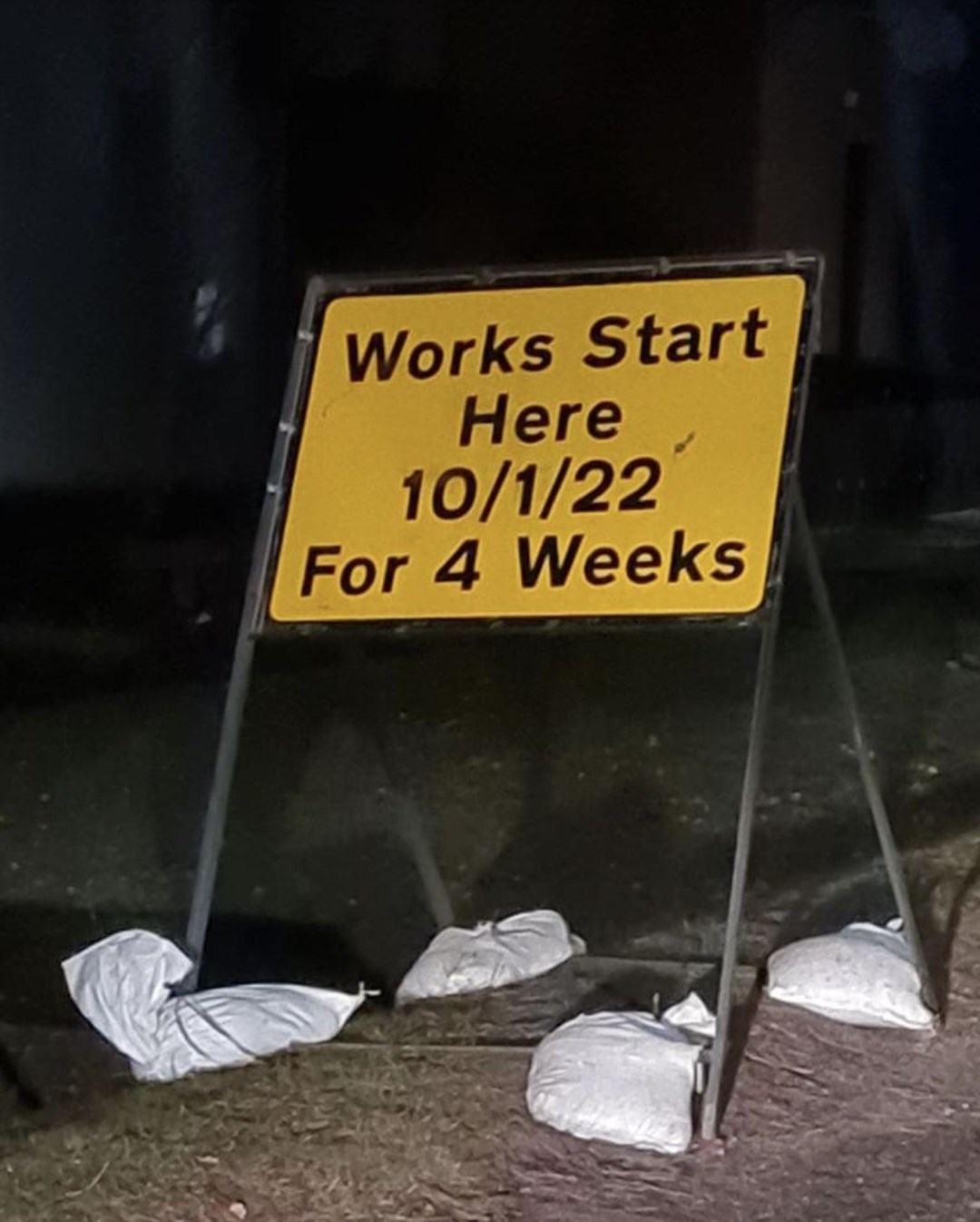 One of the signs at the junction warning of the roadworks at the junction of Grampian Road and Dalfaber Drive.