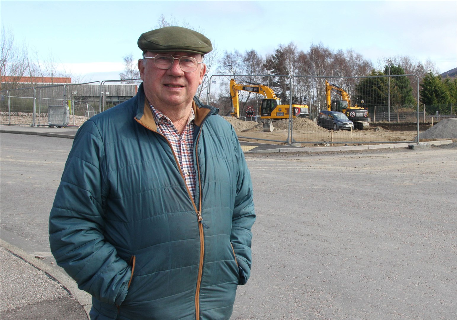 CNPA board member Willie McKenna at new affordable housing being built at Dalfaber in Aviemore.