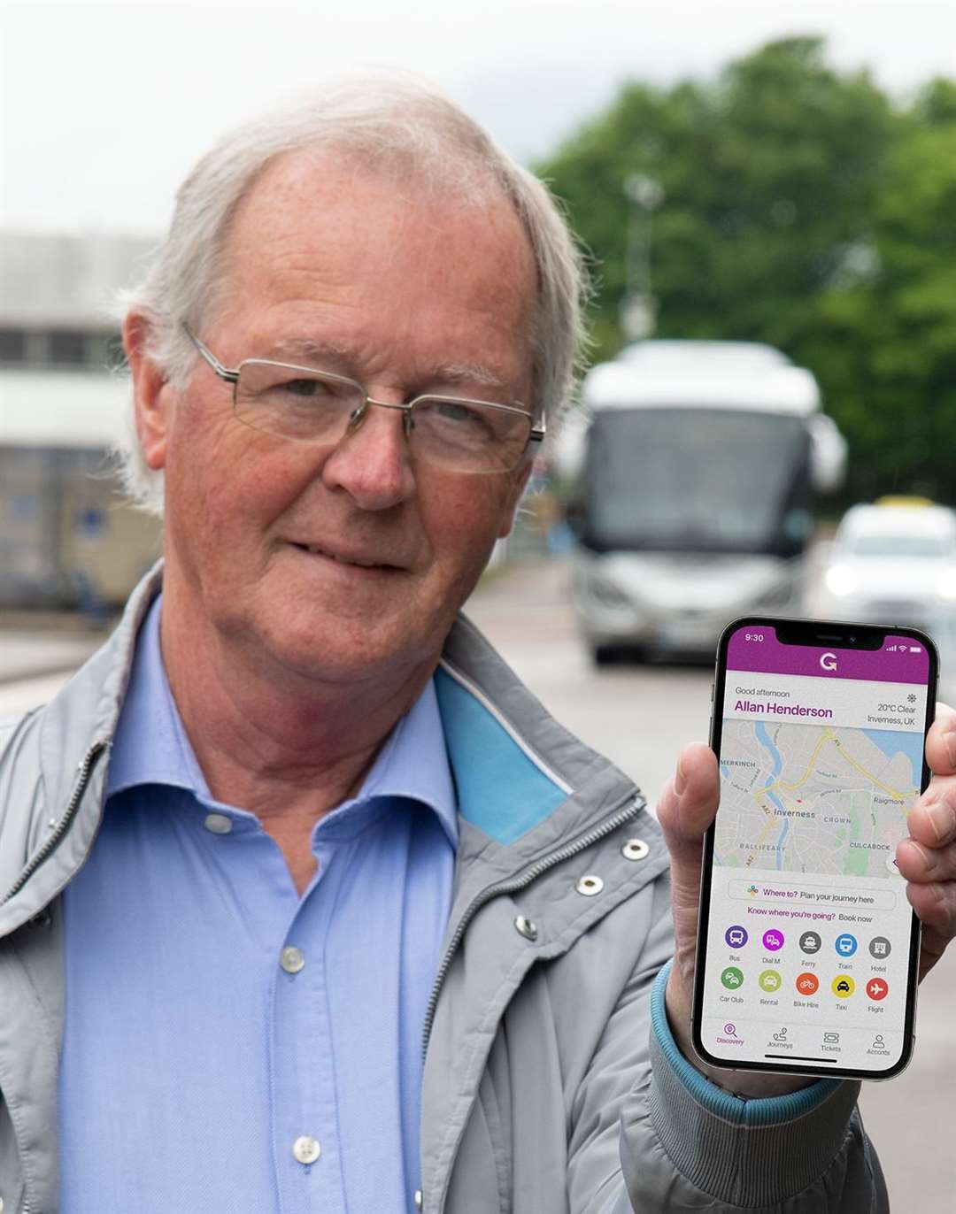Councillor Allan Henderson, chairman of Hitrans, with the new app.