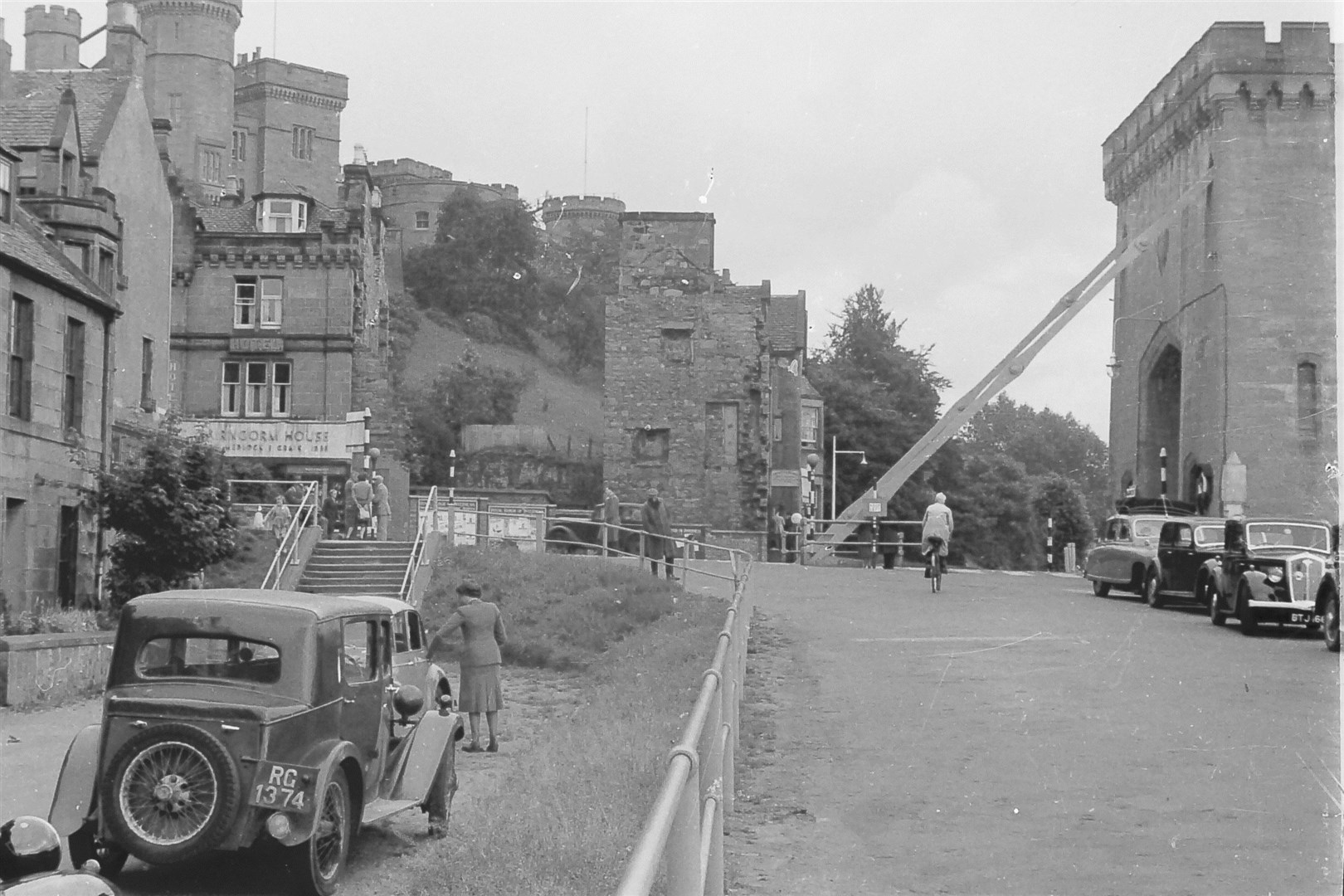 The bottom of Bridge Street in the early 1960s when the demolition of the old bridge had begun but the tower remained in place.