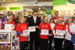 Badenoch and Strathspey MP Danny Alexander with fund-raisers at Oxfam's Inverness branch