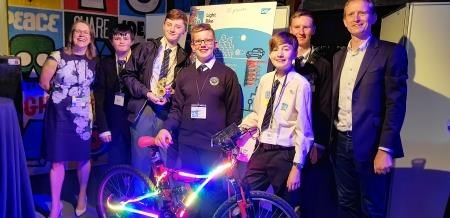 The Wick High pupils who won the Emerging Technology award at the UK Apps for Good finals this week – (from left) Nicholas Mann, Lewis Buchan, Russell Mackenzie, Caleb James and Steven Gunn – flanked by judges Amanda Gardiner and Philip Davies from SAP.