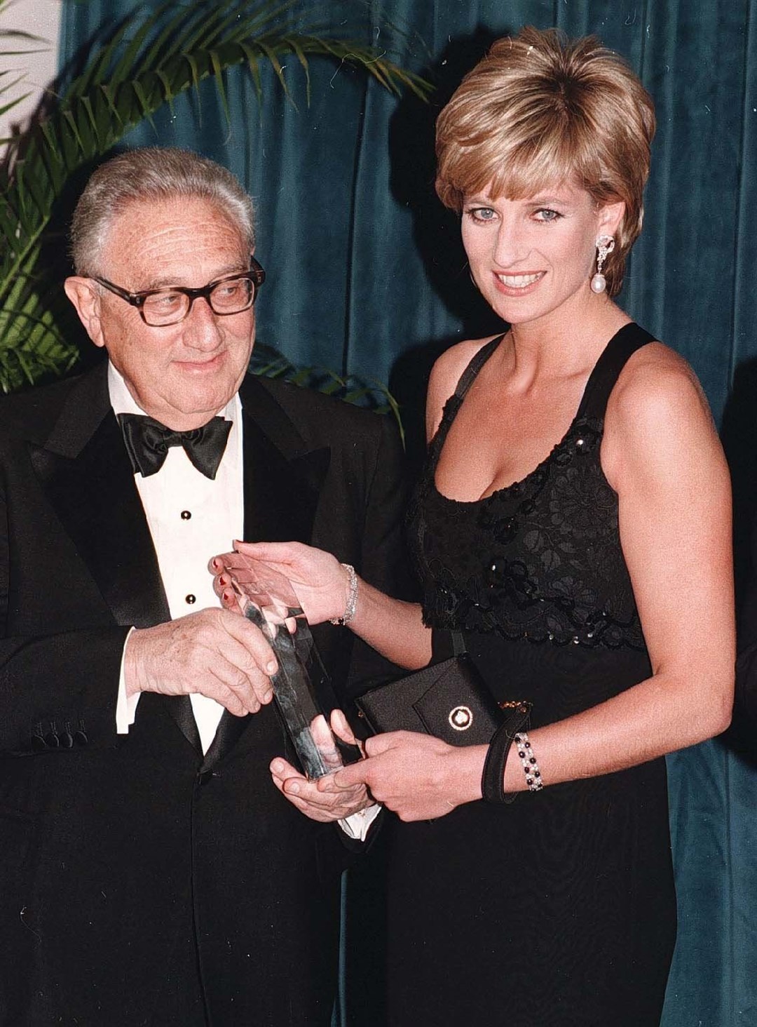Henry Kissinger with Diana, Princess of Wales, in 1995 (John Stillwell/PA)