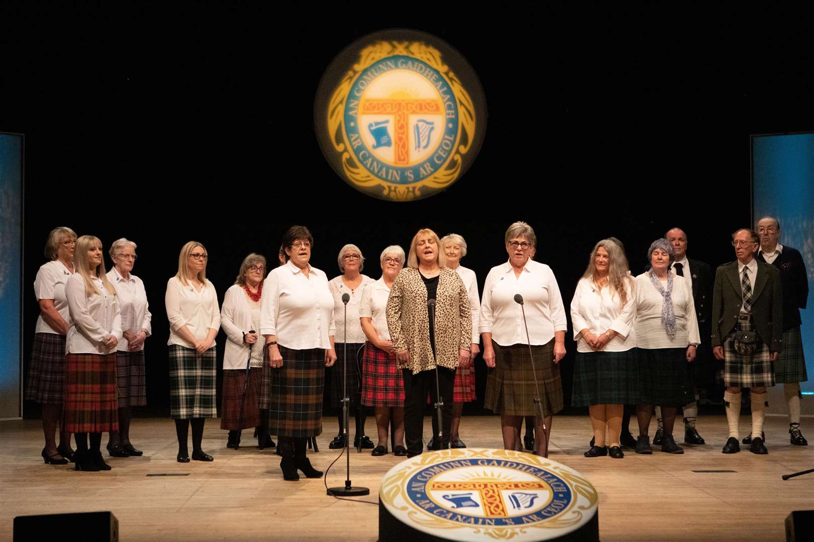 Picture shows Nairn Gaelic Choir performing on stage at Eden Court in Inverness, as choirs from around Scotland graced the Royal National Mòd stage once again on Thursday 14th October to the warmest of welcomes in the first of this year’s choir showcase concerts.