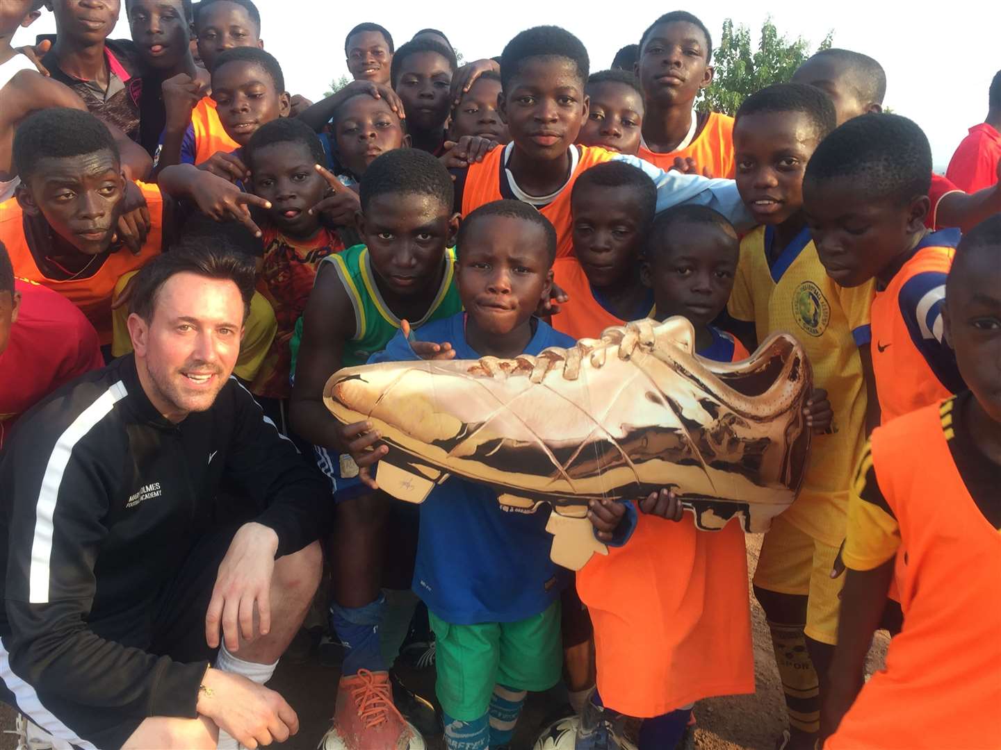 Mark Holmes has rolled out his football academies to as far as Africa.