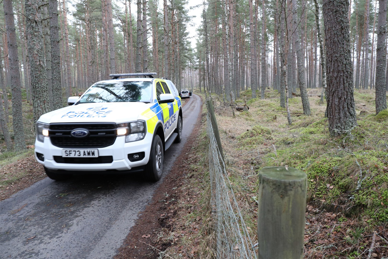Police who were searching near the village of Kincraig for the escaped monkey. (Peter Jolly)