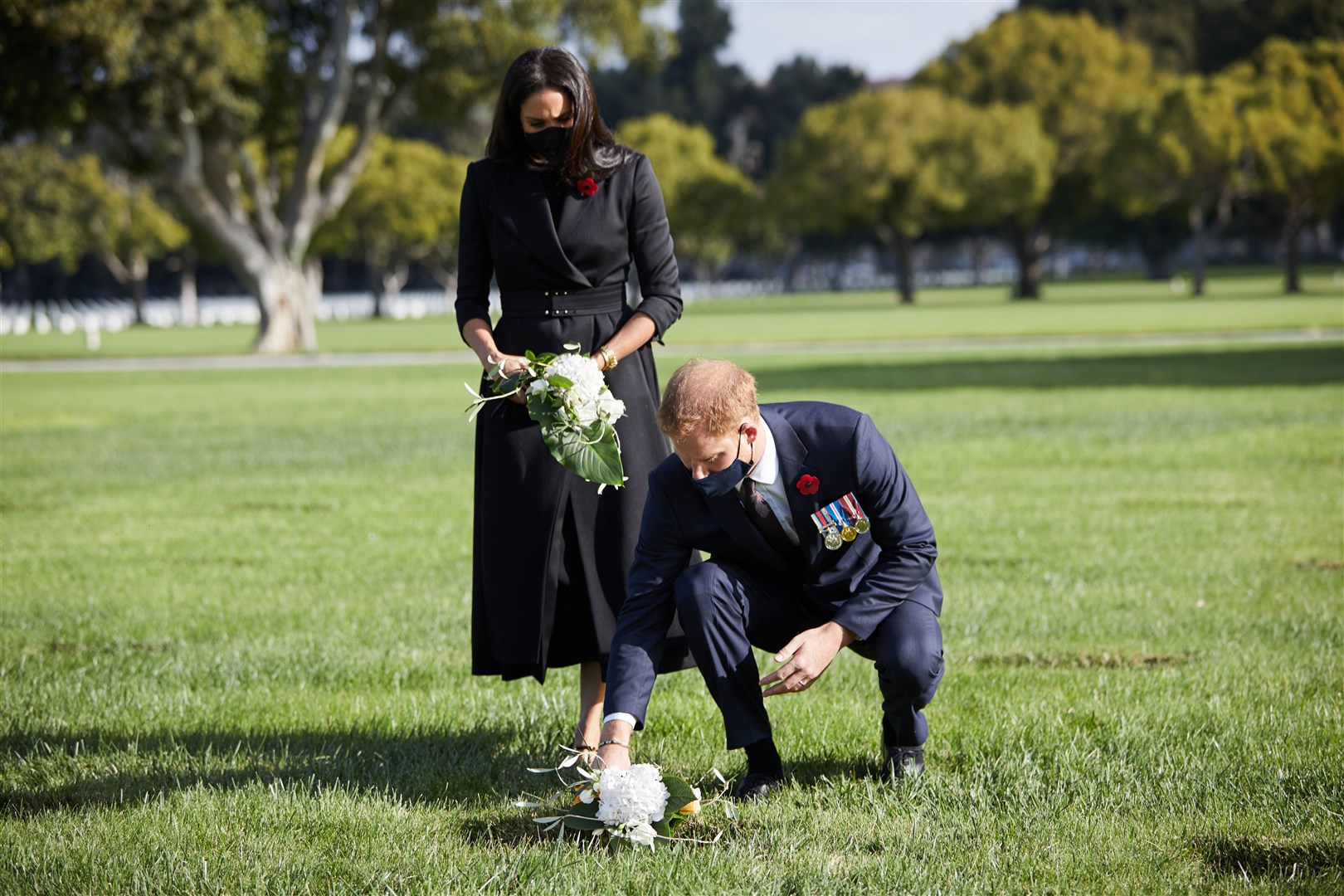 When in close vicinity to other people the couple both wore masks but removed them when on their own or at a distance (Lee Morgan/PA)
