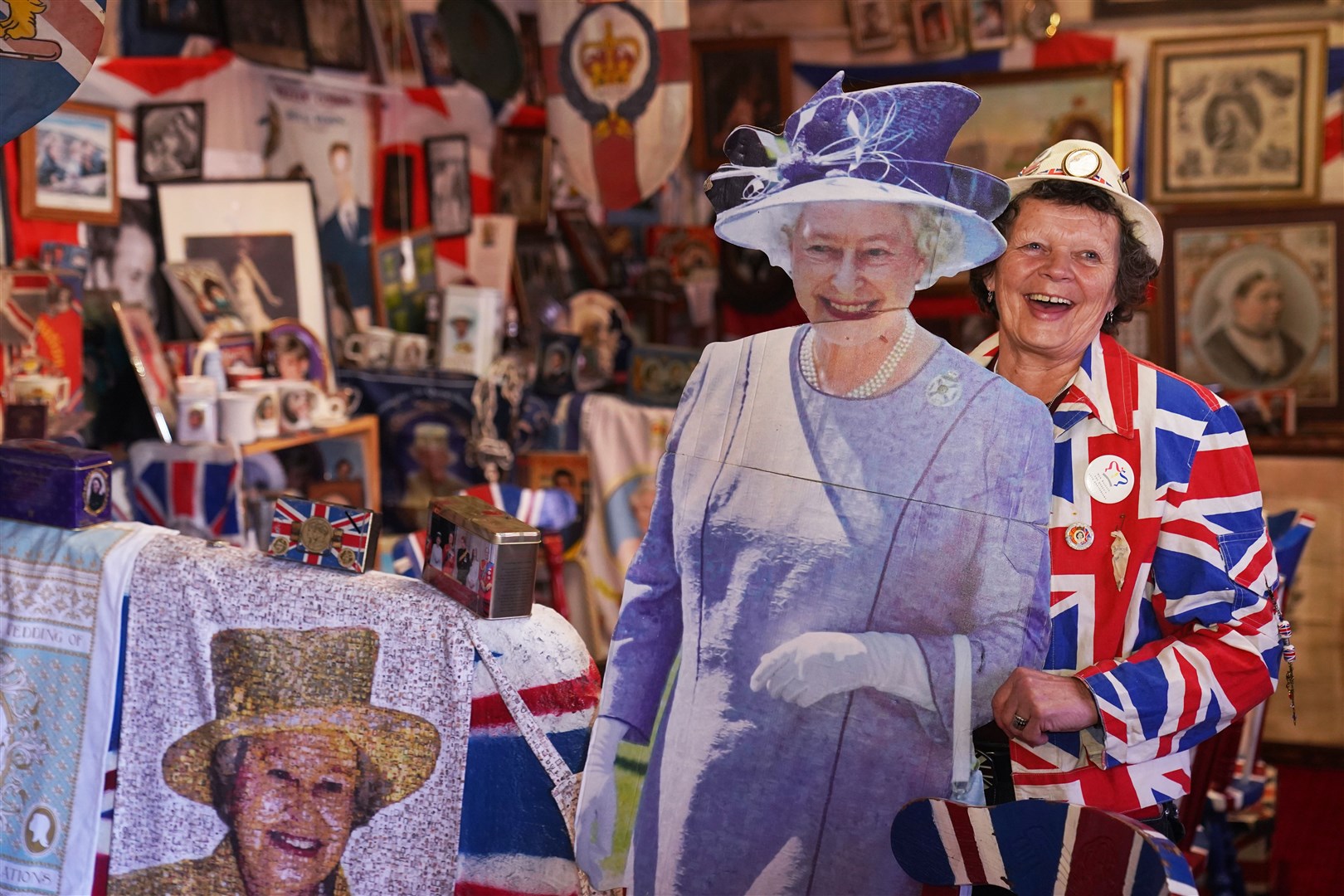 A cut-out of the Queen stands close by (Owen Humphreys/PA)