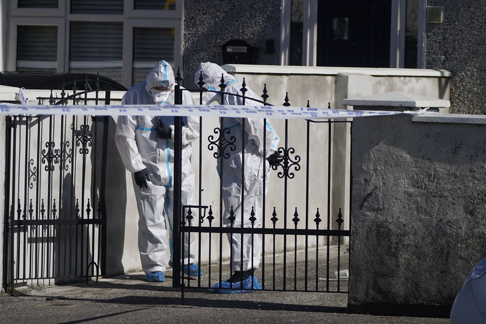Forensic officers at the scene of the incident (Niall Carson/PA)