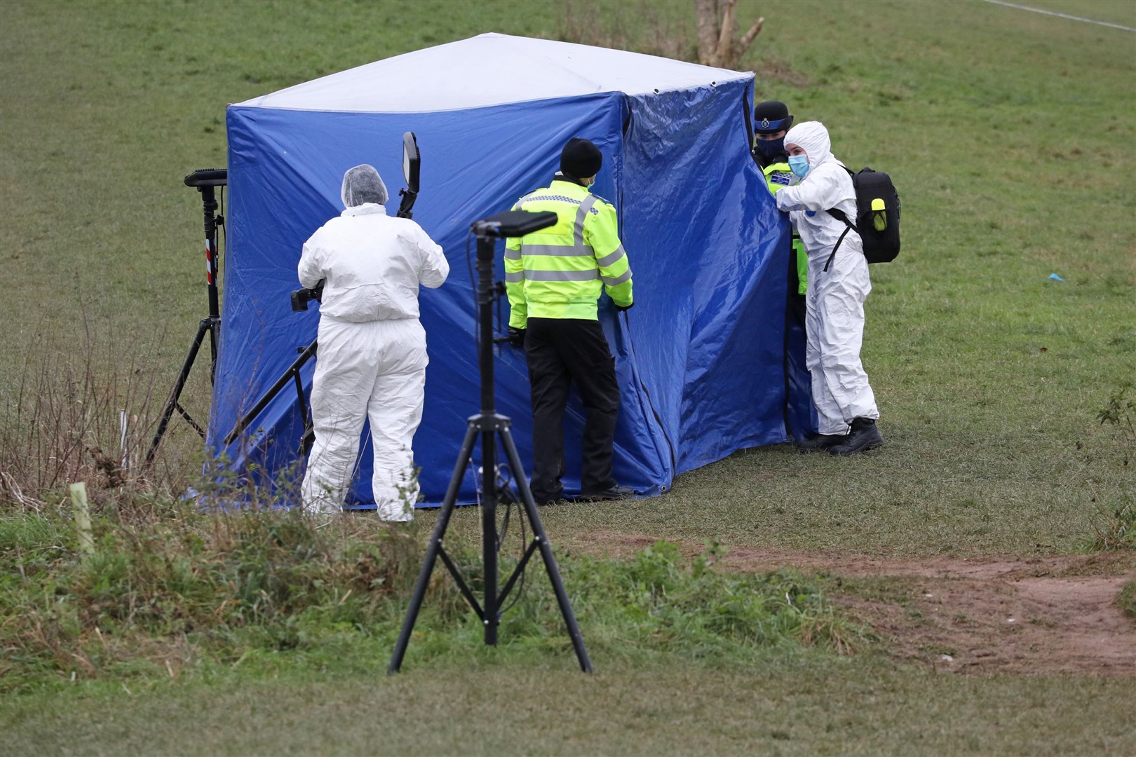 A forensic tent in Bugs Bottom field, Emmer Green, in Reading (Jonathan Brady/PA)