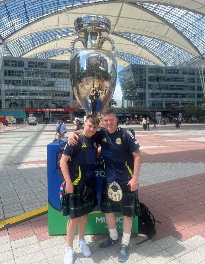 Sam and Brian Innes had to get a picture will this larger than life replica European Championship trophy.