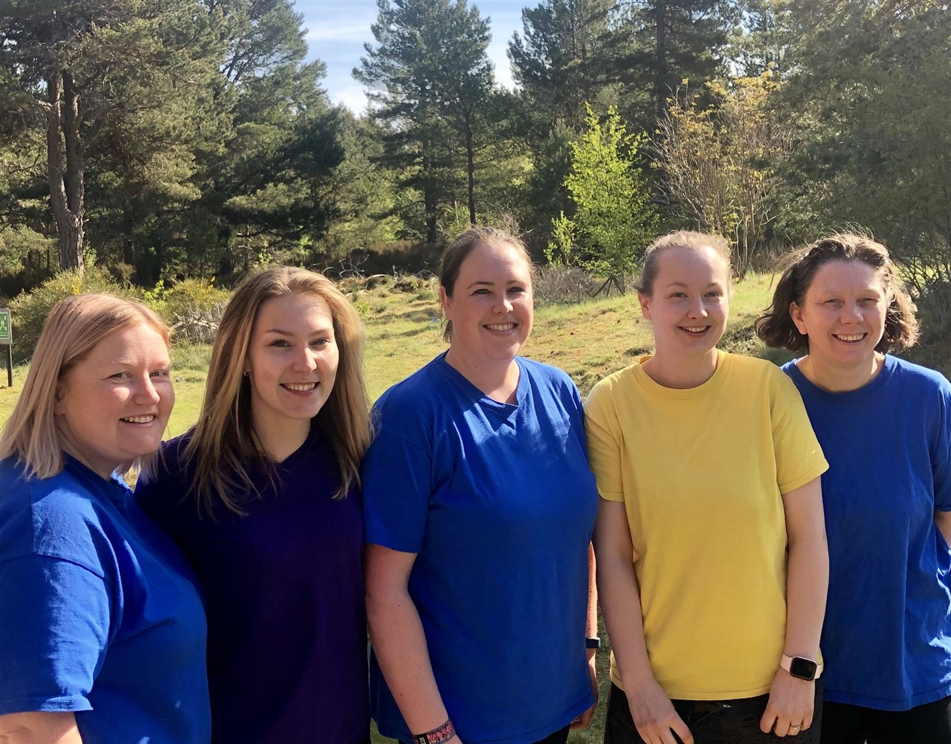 Michaela McGarvey (in yellow) and some of her team at Rosebuds have plenty to smile about after inspection report.