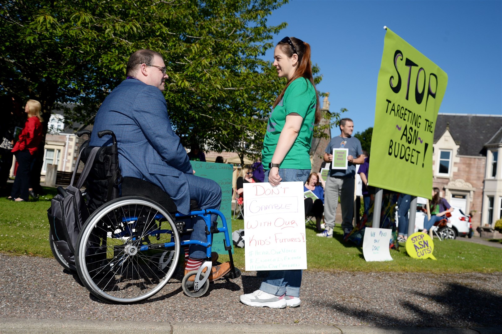 There was a demonstration against cuts to Additional Support Needs at Highland Council HQ..Campaigner Carrie Watts speaks to councillor Andrew Jarvie.....ASN Demo.Picture: Gair Fraser. Image No. 044287..