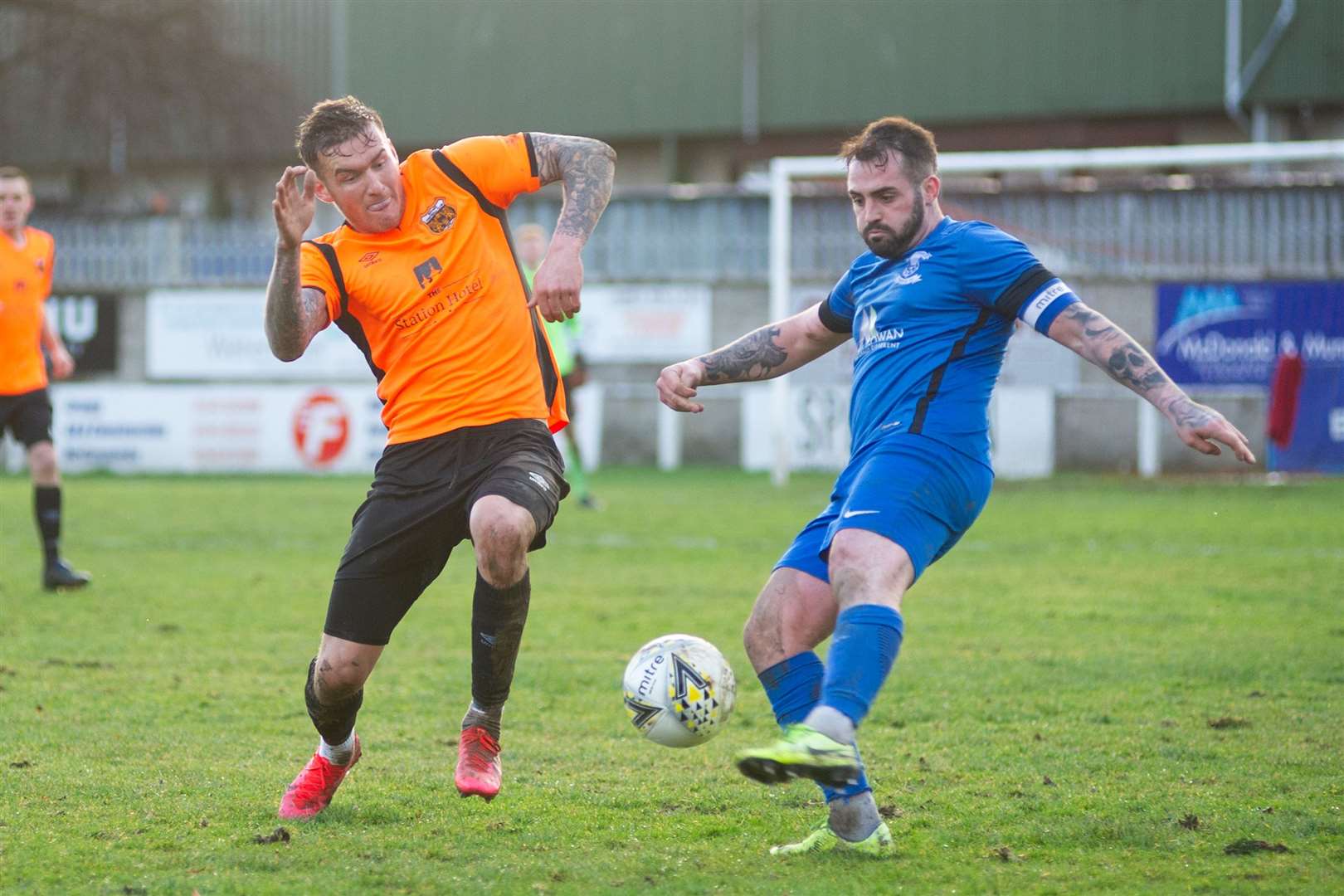 Rothes' Darryl McHardy goes in for a challenge on Strathspey skipper James Fraser. ..Rothes FC (3) vs Strathspey Thistle (2) - Highland Football League 01/02/2020 - MacKessack Park, Rothes...Picture: Daniel Forsyth..
