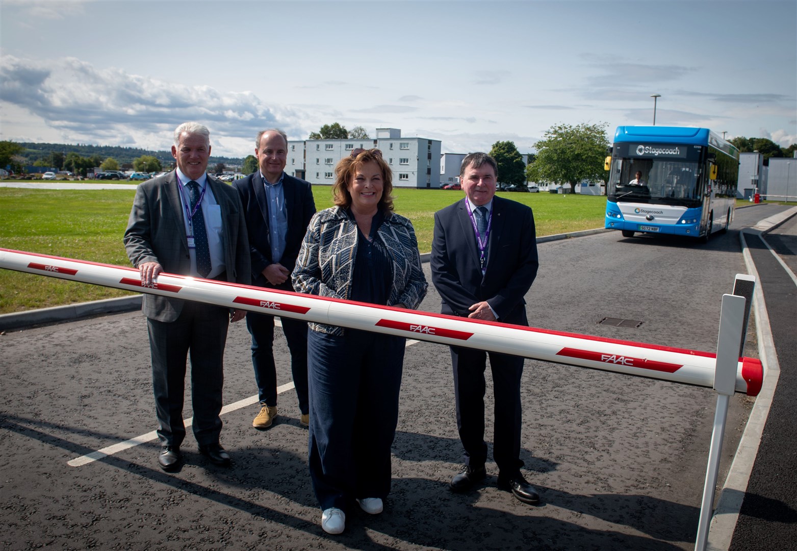 Cabinet Secretary for Transport Fiona Hyslop at the opening of Raigmore bus gate with Councillor Ian Brown, William Mainus and Councillor Ken Gowans.