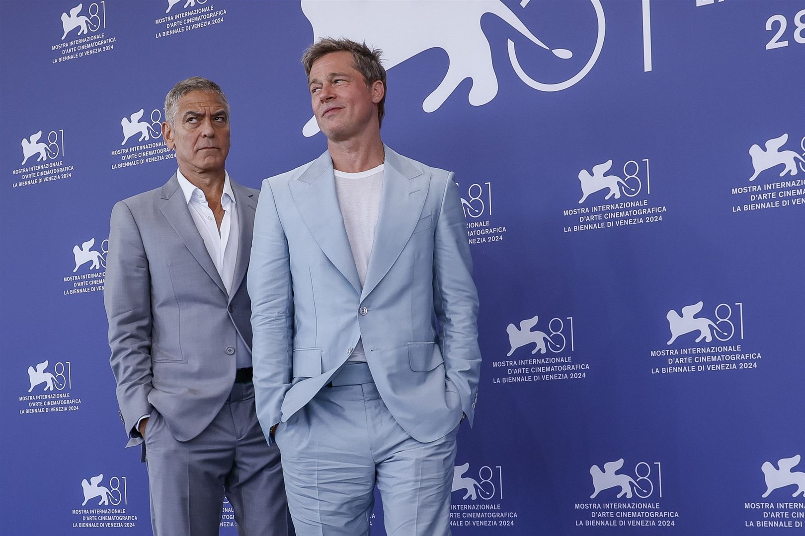 George Clooney (left) and Brad Pitt at the Venice Film Festival (Joel C Ryan/Invision/AP/PA)