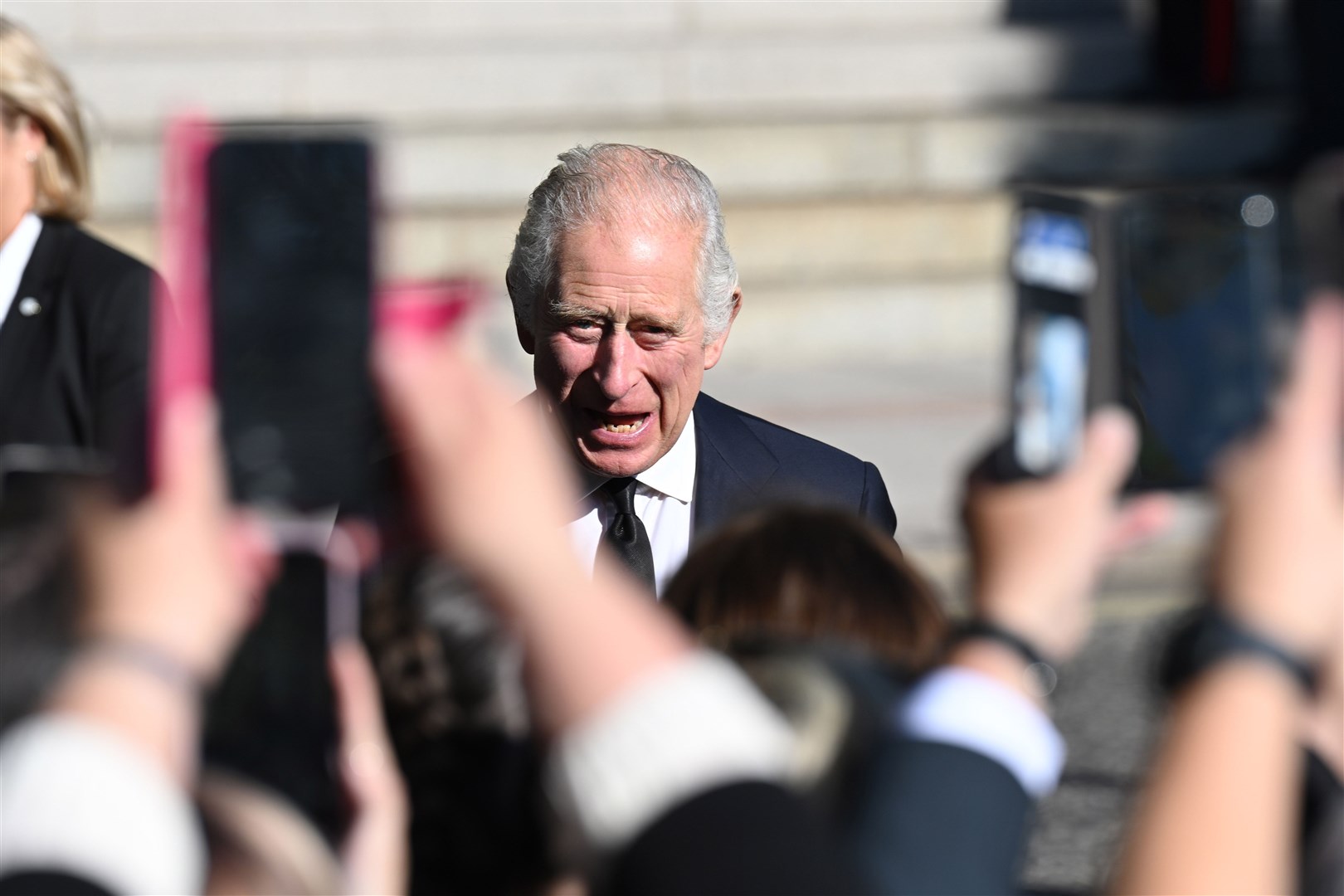 King Charles III greets well wishers outside St Anne’s Cathedral (Michael Cooper/PA)