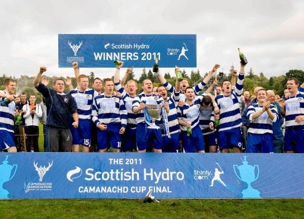 Newtonmore players and staff celebrate their win (Neil Paterson)