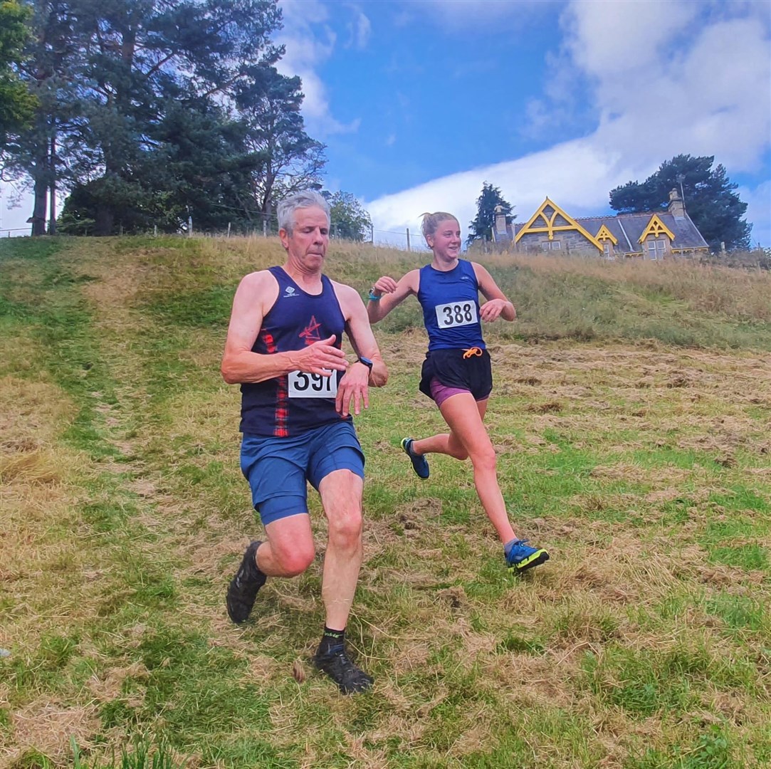 Alistair Mathews of Highland Hill Runners outsprints Laggan lass Katie Slimon to the line at Kingussie