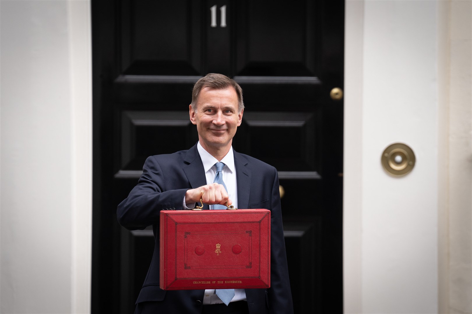 Chancellor Jeremy Hunt said there will be more rigorous sanctions for those who fail to meet strict work-search requirements (Stefan Rousseau/PA)