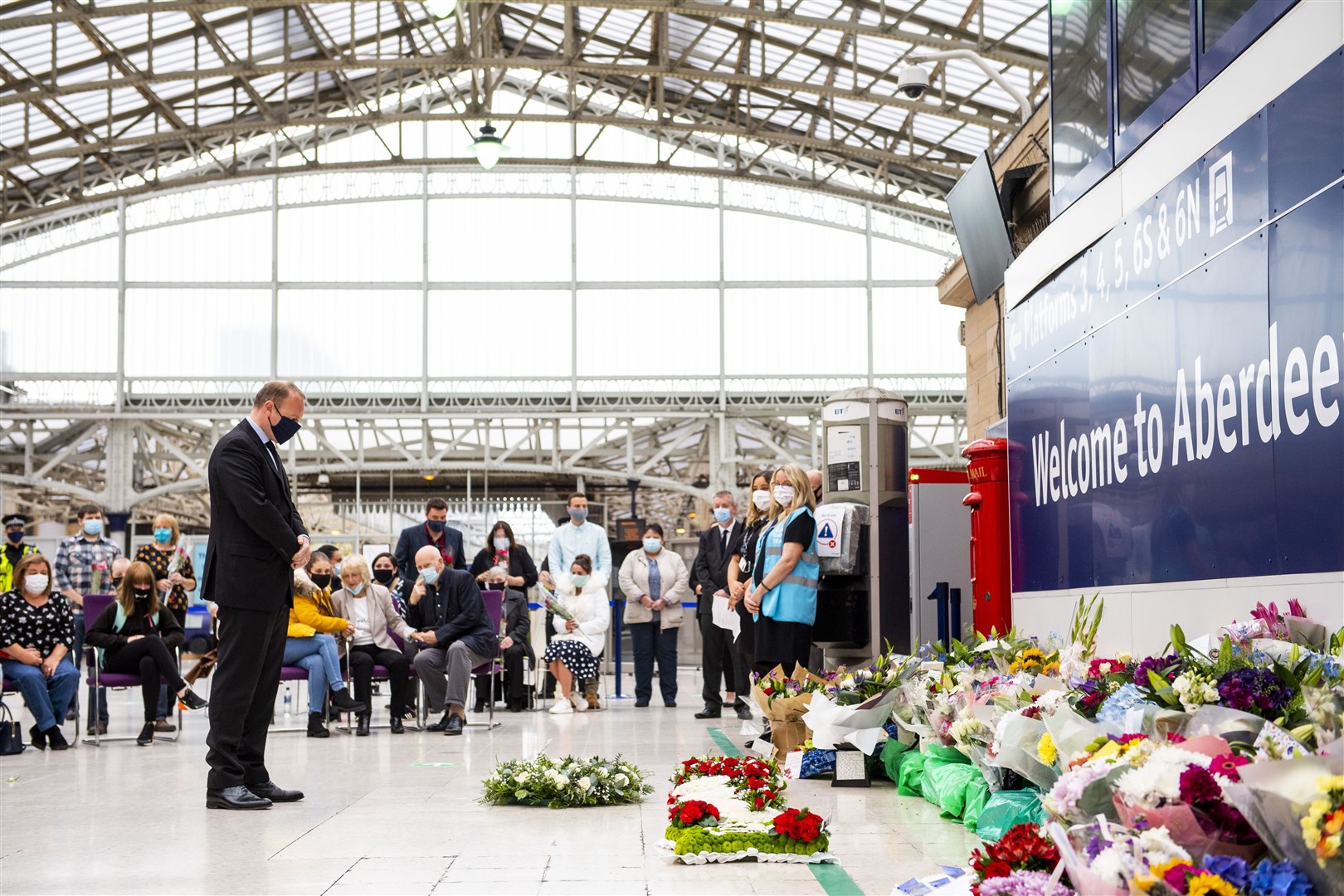 Alex Hynes, managing director of Scotland’s Railway lays at wreath at Aberdeen station as the railway remembers those who lost their lives in the Stonehaven derailment last Wednesday. (ScotRail/SNS)