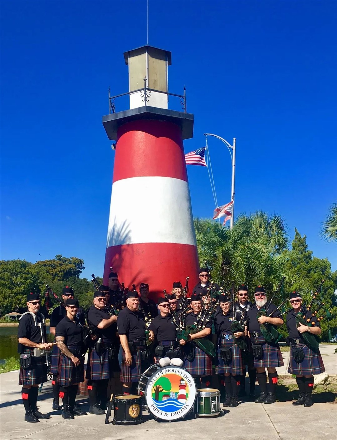Lighting up time: the City of Mount Dora bandsmen are preparing to head for Badenoch