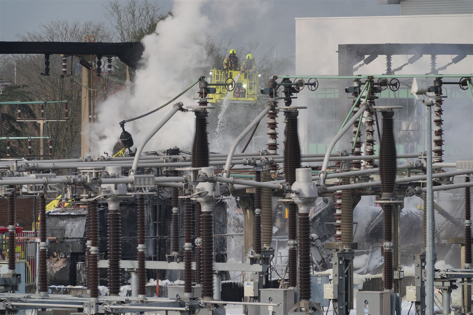 Firefighters at the North Hyde electrical substation which caught fire (Jonathan Brady/PA)