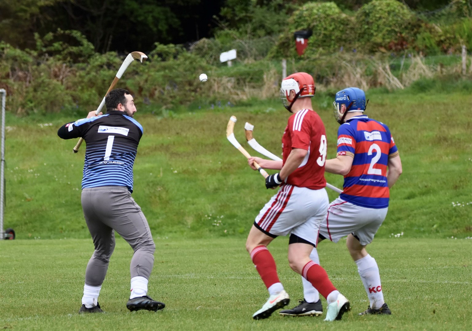 Keeper Bob McGregor clears the danger for Kingussie. Picture: Fiona Young.