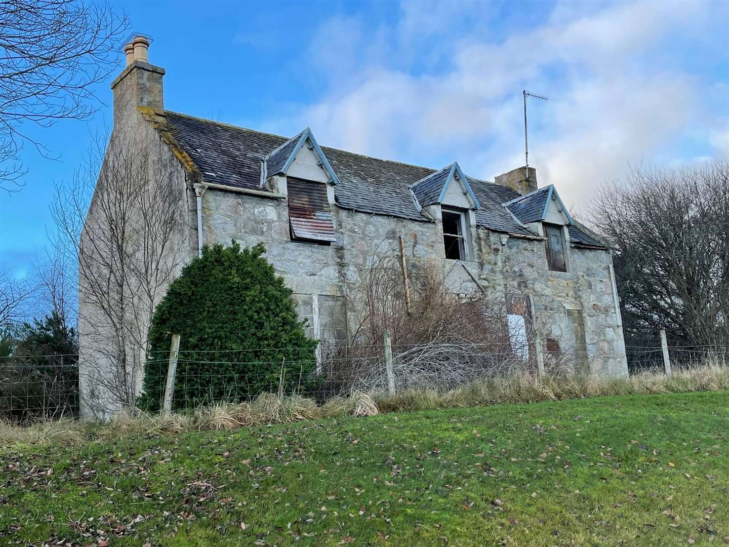 The old Dalfaber Farmhouse which has been derelict for many years and overlooks the first tee at Spey Valley golf course.