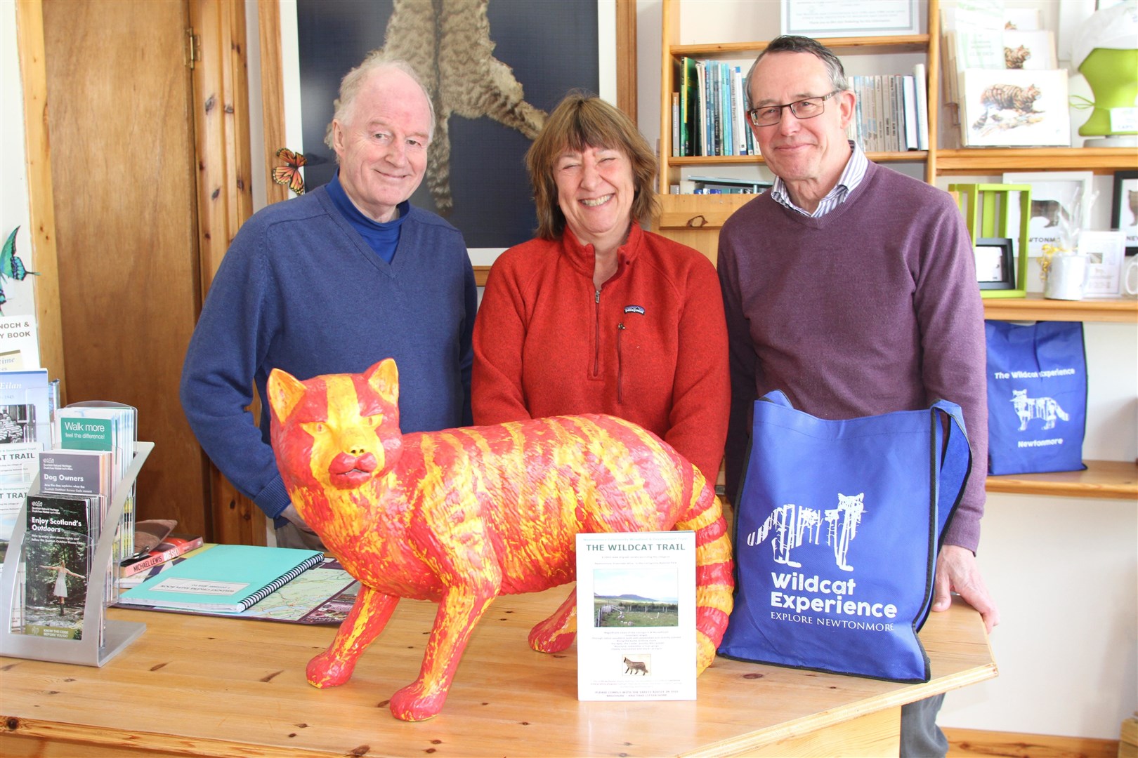 Trust secretary Paul Allan (in purple) with volunteers Colin MacPhail and Yvonne Richmond.